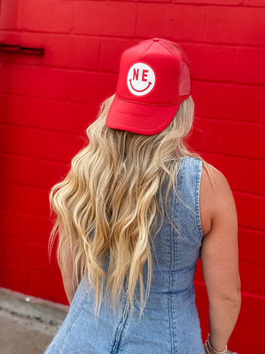 Red NE Smiley Trucker Hat